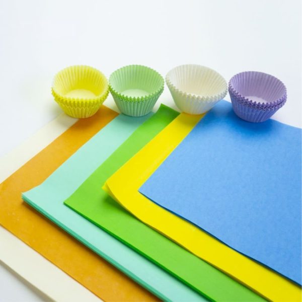 Colored greaseproof paper sheet is used to make cake baking cups.