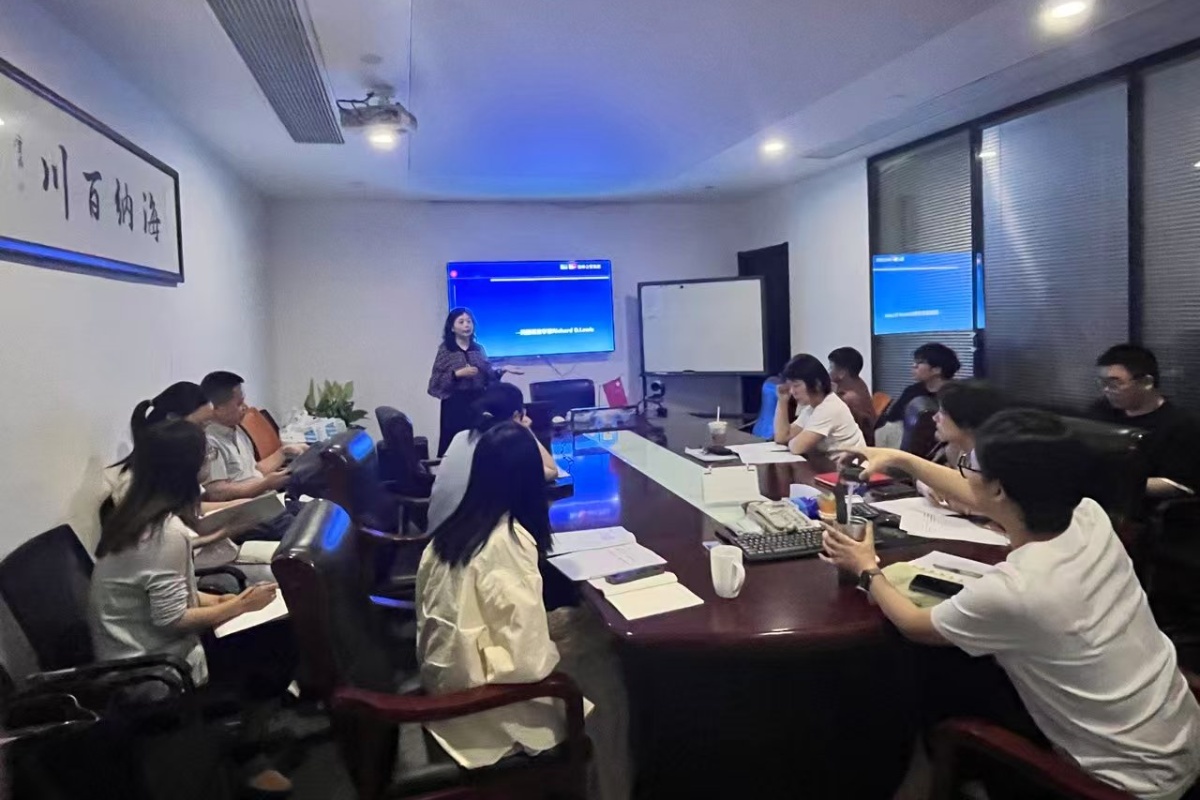 Team members from Hangzhou Hongchang Paper attending a foreign trade training session to enhance sales skills.
