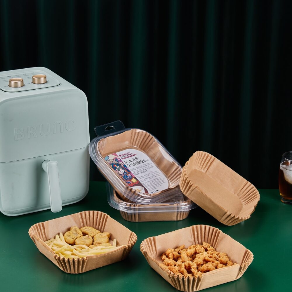 Square air fryer paper liners with food and air fryer