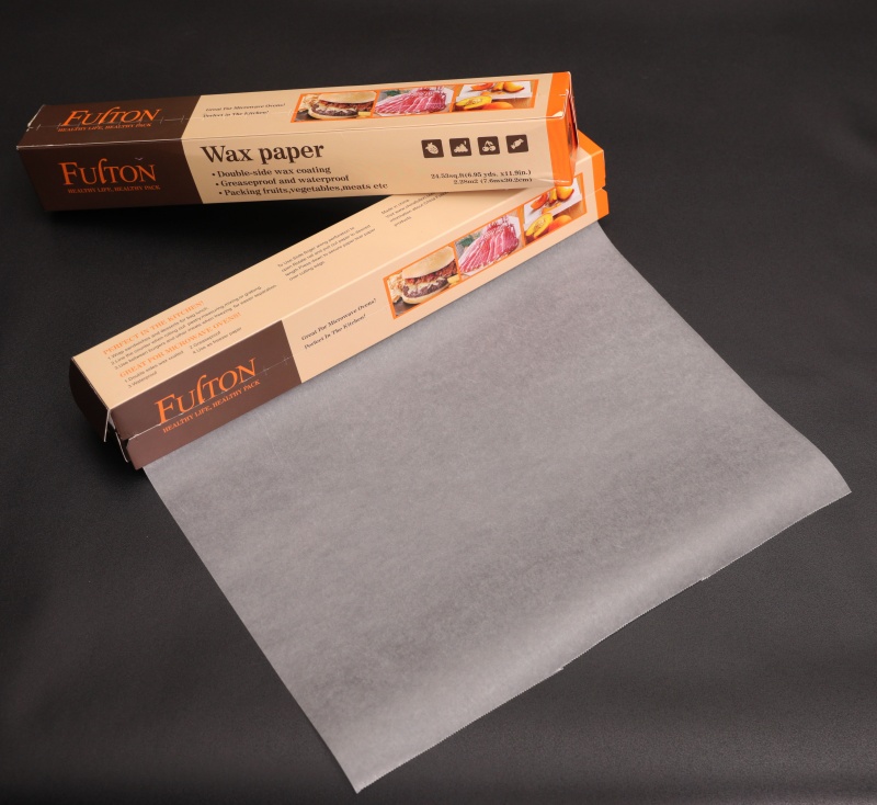 The roll of greaseproof paper is packaged inside the box.